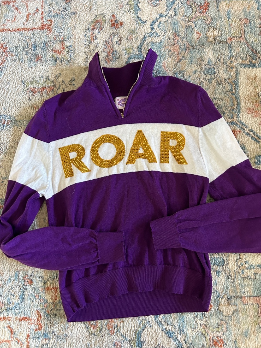Purple ROAR Pullover Sweater with White Band and Gold Lettering